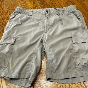 The North Face men’s khaki color shorts.  Nylon hiking. Size Large. Stain.